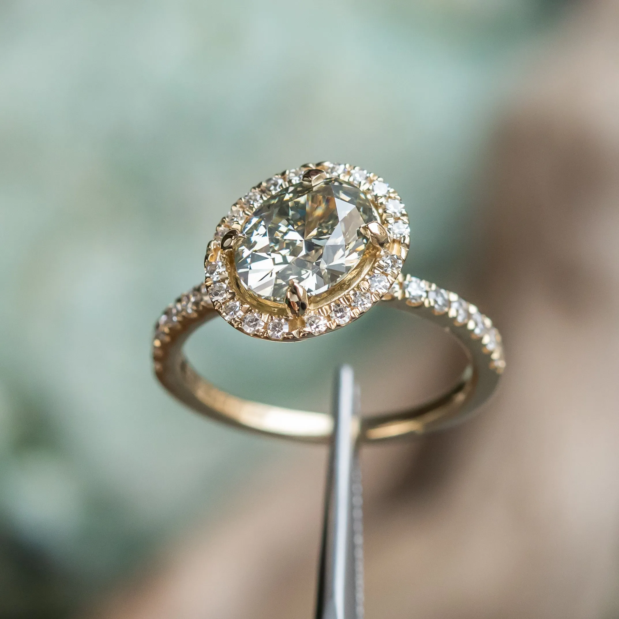 1.70ct Fancy Oval Grey Diamond and Askew Diamond Halo in 14K Yellow Gold