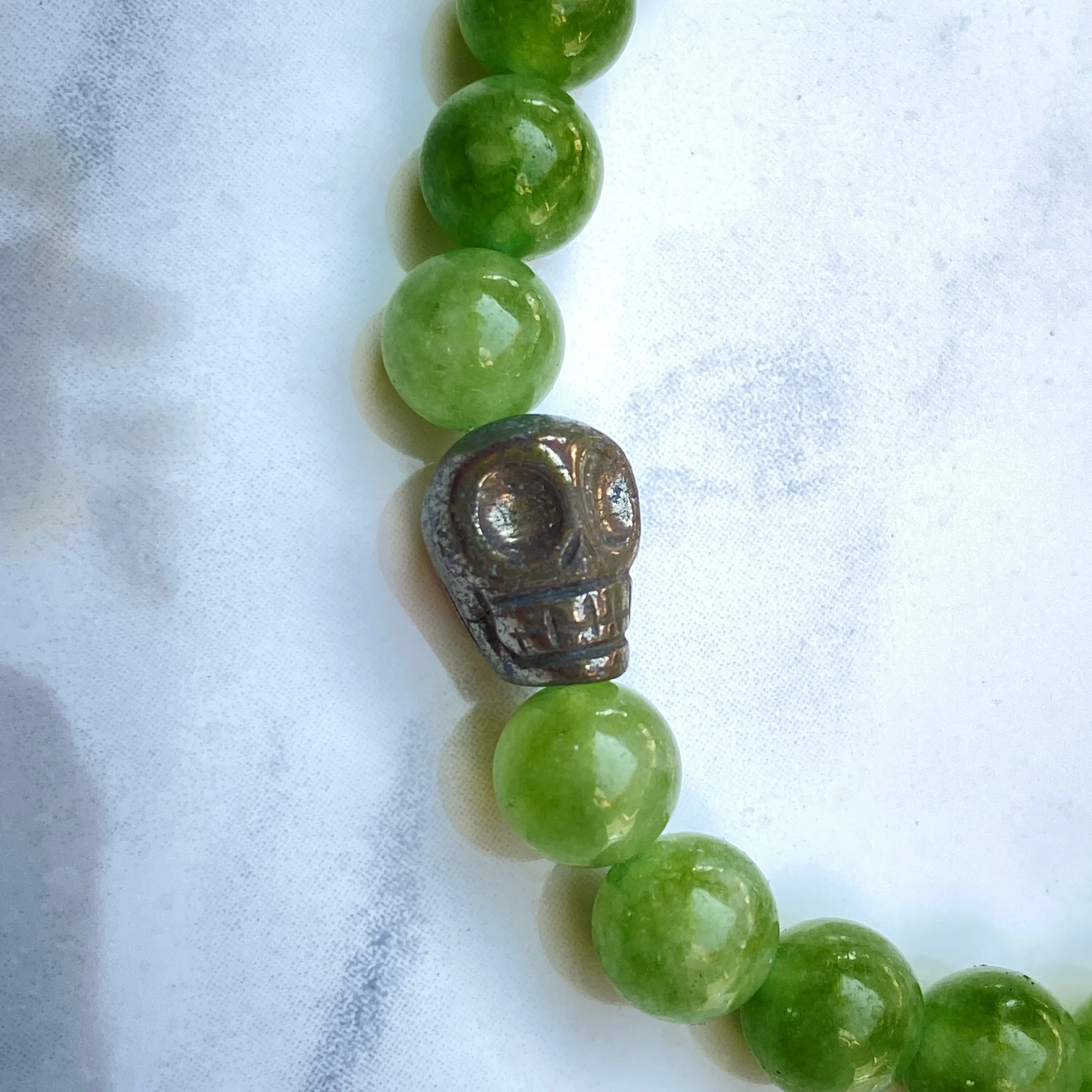 Peridot and Pyrite Skull Bracelet